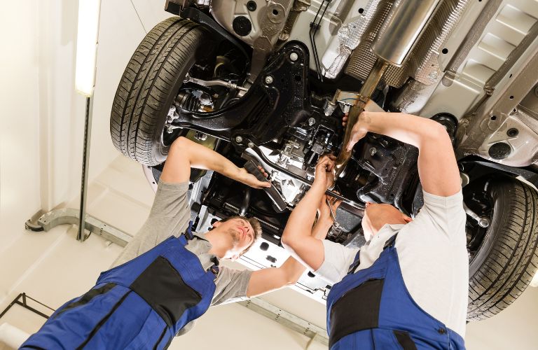 Technicians Working on a Vehicle