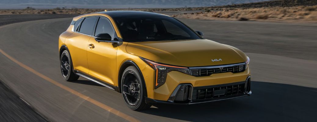 front view of the 2026 Kia K4 Hatchback on the road